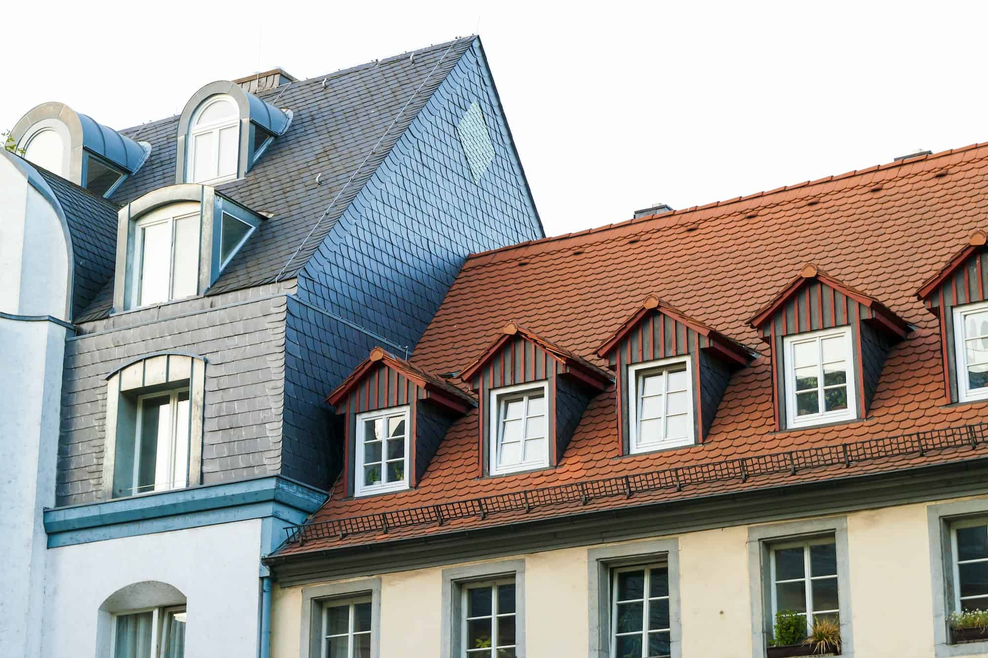 roofs-of-old-houses-with-roof-windows-and-orange-roof-tiles-in-german-city.jpg